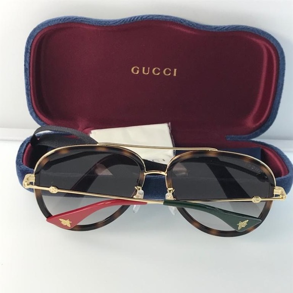 GUCCI Brown Gradient Sunglasses
GG0062S 012 57 - Picture 9 of 15